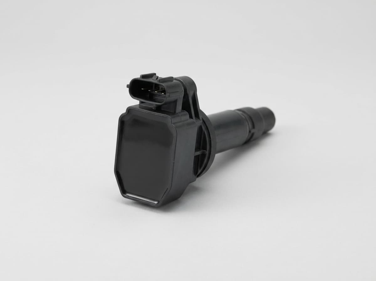 Ignition coil, coil-on-plug on a clean studio background