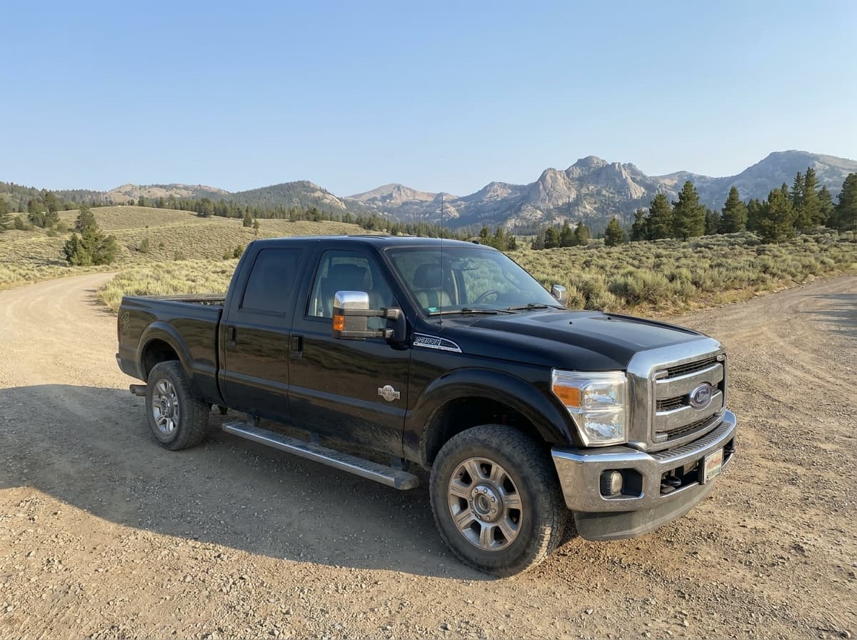 Primary listing photograph: 2013 Ford F-350 King Ranch in working context, no logos overlaid, no identifiable close portraits